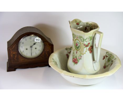 An Edwardian inlaid mantle clock, H. 25cm, with an Edwardian jug and bowl set.