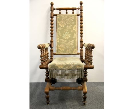 A 19th century bobbin rocking chair.