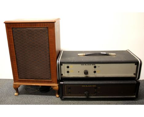 Two vintace Ice Slave 100 amplifiers with  a teak speaker.