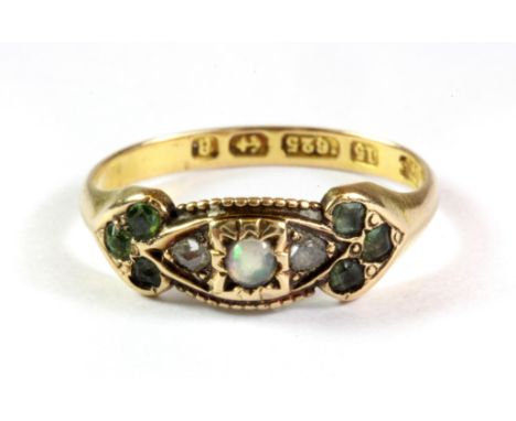 A Victorian 15ct yellow gold ring set with opal rose cut diamonds and peridots, (N.5).