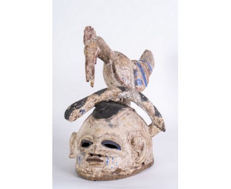 African art Gelede mask, YorubaNigeria. . Cm 43,00 x 43,00. Helmet headdress mask with elaborate crest depicting cock struggl