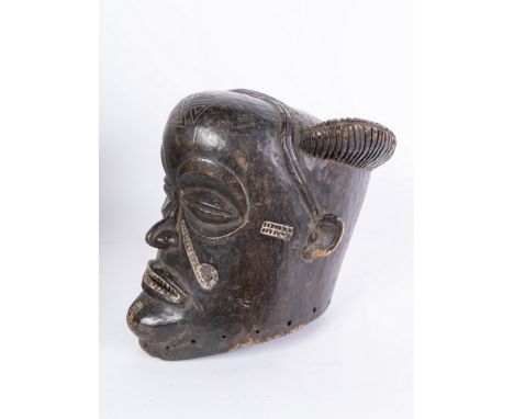 African art Helmet mask, Chokwe R.D. Congo . . Cm 27,00 x 29,00. Dark patina wooden mask. On the face it has the typical Chok