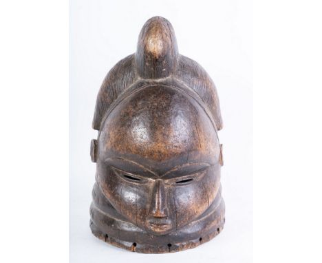 African art Bundu/Sowei mask, MendeSierra Leone. . Cm 29,00 x 38,00. helmet headdress intended for the Ndoli Jowei, “the one 
