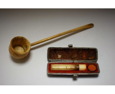 An early 19th century bone ladle, 16.5cm long, c.1820; a bone seal, snakeskin case, 9cm c.1850
