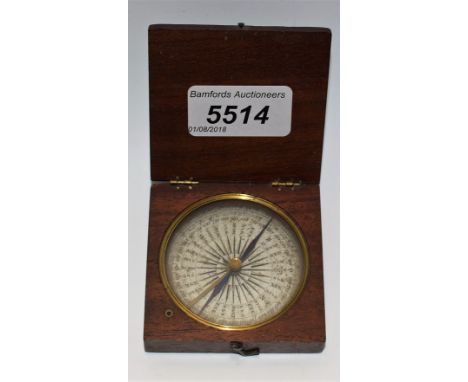 A 19th century mahogany travelling pocket compass, 5.5cm register, the blued steel indicator locking in place for transit, hi