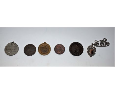 A Bartleet and Hemming token, 1813; a silver athletics fob, 1928; a World War One Victory medal, 31512 PTE B. Ogden, Dorset. 