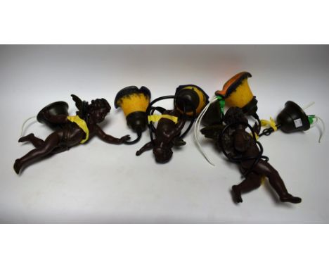 A set of three Art Nouveau style lights
