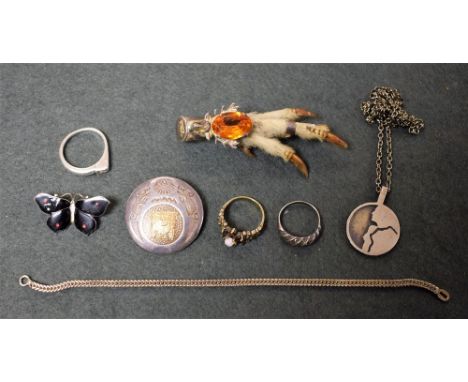 A silver and enamel butterfly brooch; silver rings; pendant; brooches