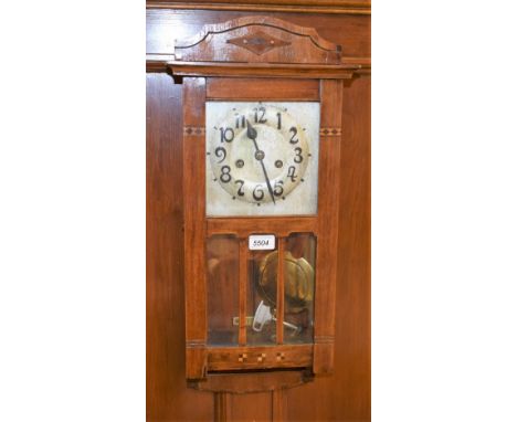 An Art Deco style inlaid mahogany wall clock