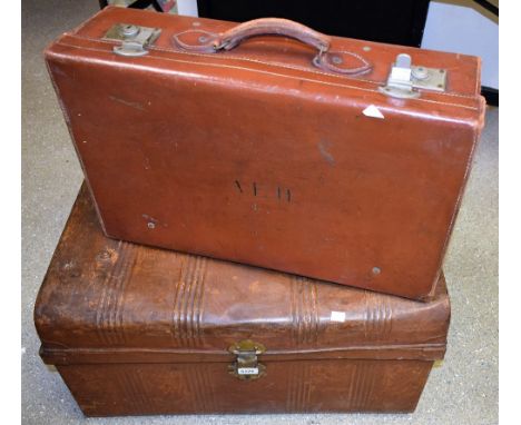 A 19th century cabin trunk; a leather suitcase (2)