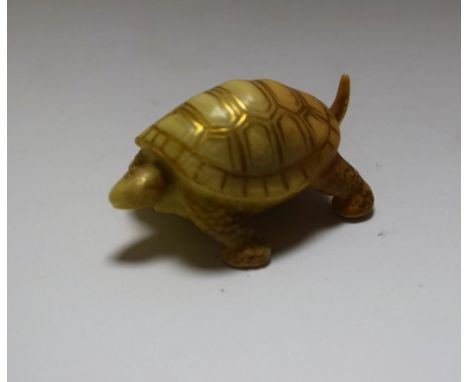 A Royal Worcester blush ivory miniature model of a tortoise, picked out in gilt, 5cm wide, printed mark in puce, date code fo