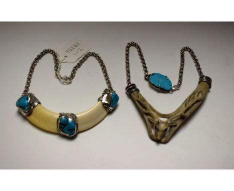 Tribal Art - a Native American silver mounted stag antler necklace, the front carved as the beast and set with faceted stones