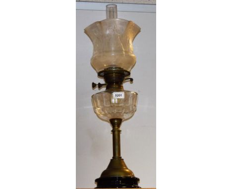 A Victorian brass oil lamp, with etched glass shade