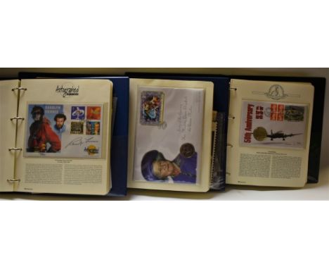 Coins and Stamps - three albums of presentation coins and franked first day covers, including Royal history, some signed, etc