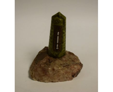 A lighthouse specimen stone thermometer desk weight, quartz base, 11cm high