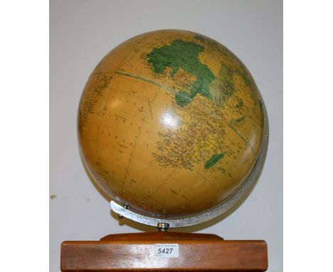 A 13.5 inch terrestrial globe, The Phillips Challenge Globe, the base with provision for an atlas, 43cm high