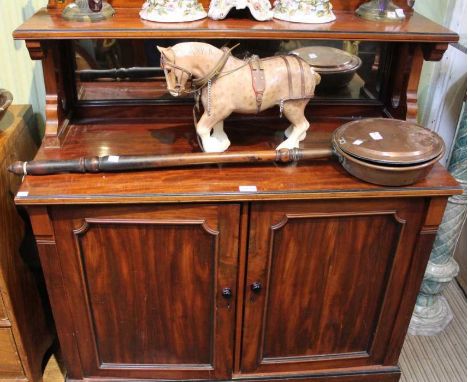 A 19th century mahogany cabinet, upstand back with shelf and mirror, over two cupboard doors, 103cm wide, 112cm high