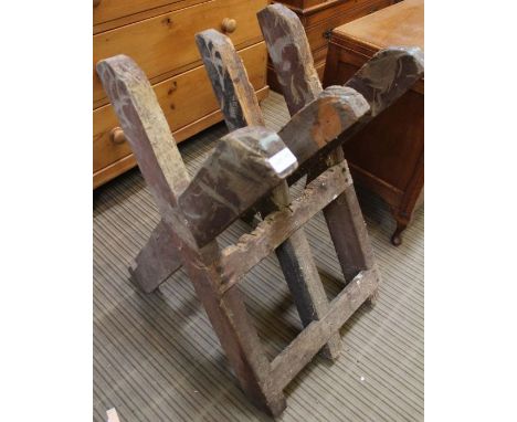A free standing wooden log caddy (for chainsaw cutting)