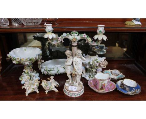 Continental ceramics, flora encrusted includes two tier figurative candelabra, Coalport, oil lamp base &amp; two decorative c