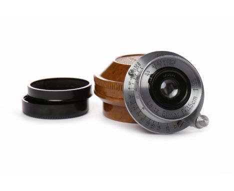 LEITZ ELMAR SCREW MOUNT LENSchrome finish, f=3,5cm 1:3,5, serial number 570536, fixed lens, in original unusual brown bakelit