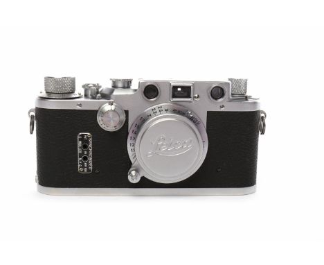 1946 LEICA 3C WITH STEPchrome finish, serial number 409111; fitted with Leitz Elmar f-5cm 1:3,5 lens, serial number 647373, c