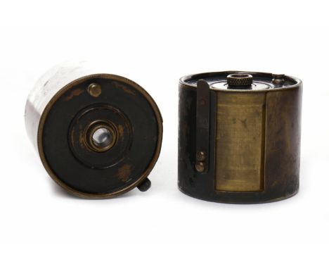 SET OF LEICA 250 REPORTER FILM SPOOLSwith black and white film inside, each stamped 'Z', one etched 'R+' (2)Note: These spool