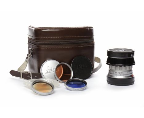 ERNST LEITZ GMbH WETZLAR SUMMICRON LENSf=5cm, 1:2, serial number 1571832; together with five lens filters all marked for New 