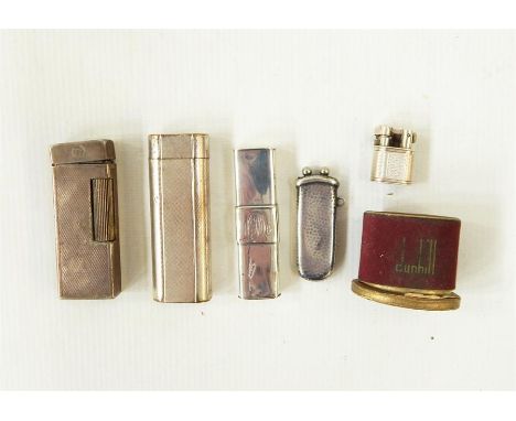 Cartier silver plated lighter, no.98994 with engraved decoration, similar Dunhill lighter, pair silver plated folding cigar c