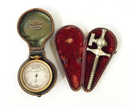 J B Winter, Newcastle on Tyne pocket barometer in case and a winder in case (2)   