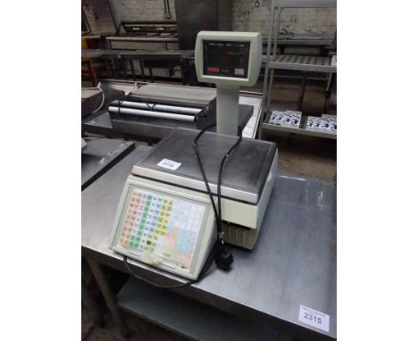 Avery Berkel M0202 electronic scales.   Estimate £30-40.