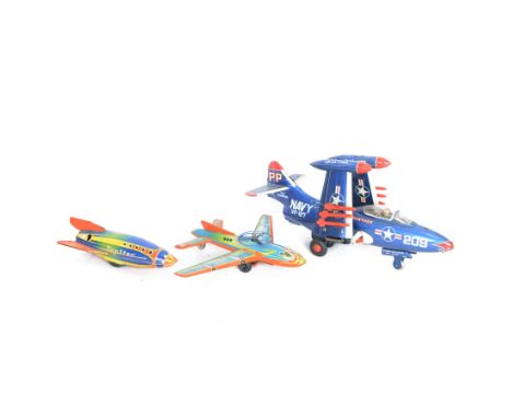 Three tinplate friction drive vehicles, to include Japanese Yonesawa Grumman F9F-5 Panther Aircraft with pop up wings, a Tech