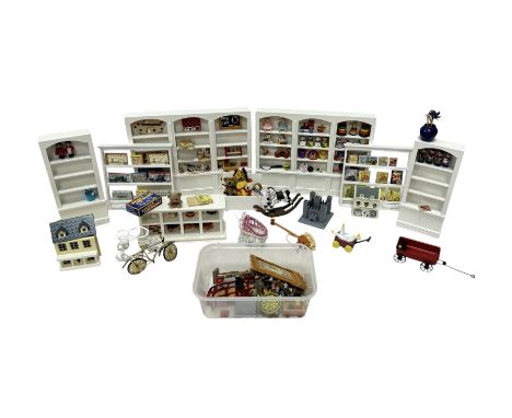 1:12 scale dolls house toy shop/nursery furniture, comprising white wooden shelving units and toy box, metal bikes and pram, 