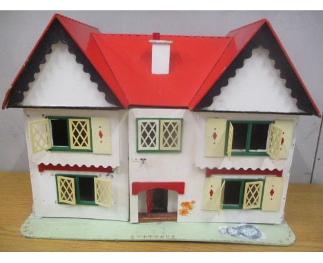 A vintage painted dolls house 