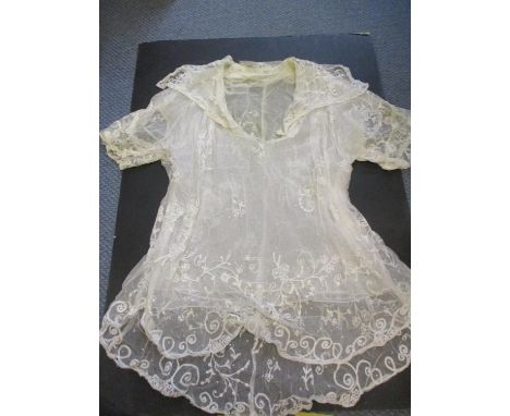 A fine collection of bobbin turned and hand sewn lace items from the 18th, 19th and 20th centuries to include a lace blouse w