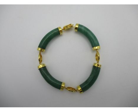 A Chinese jade coloured and yellow coloured metal four sectioned bracelet with character decorated links, stamped 14k 
