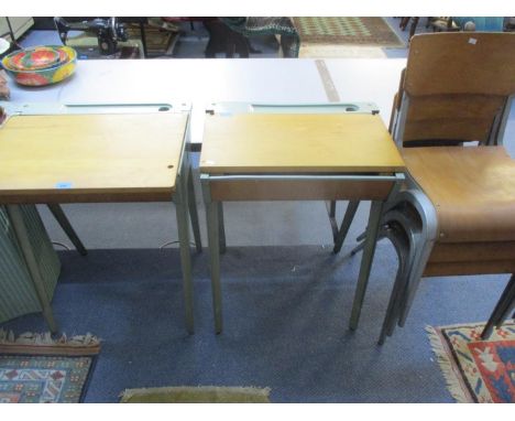 Two vintage British Esavian school desks with green metallic frame together with three vintage school chairs 