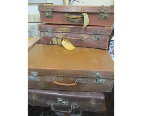 A selection of six vintage leather suitcases 