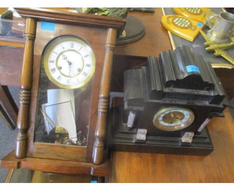 A Victorian black marble cased mantle clock and a modern mahogany case regulator style clock 