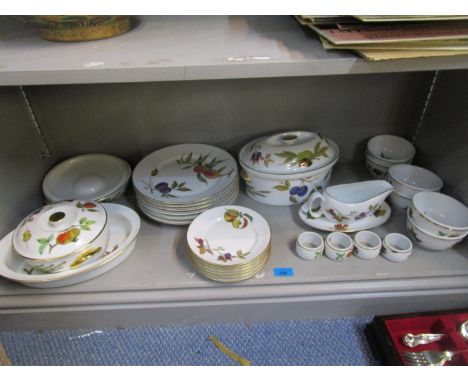 Royal Worcester Evesham pattern dinner service, three tureens, dinner plates, soup bowls, napkin rings and other items 
