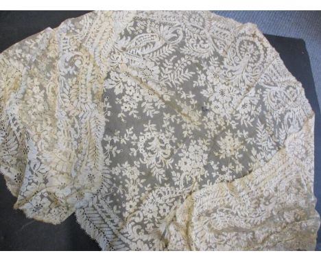 A fine collection of bobbin turned and hand sewn lace items from the 18th, 19th and 20th centuries to include a cream lace sh