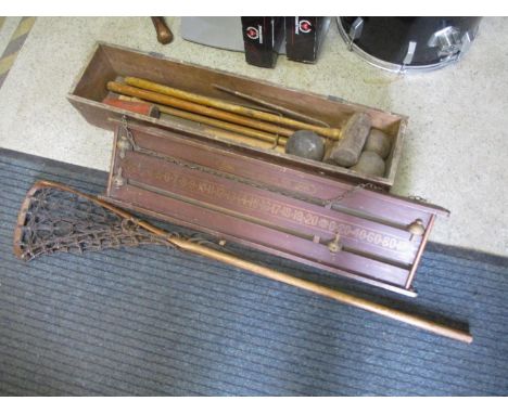 Vintage games including an early 20th century George Edwards mahogany snooker scoreboard, a child's croquet part set and a Le