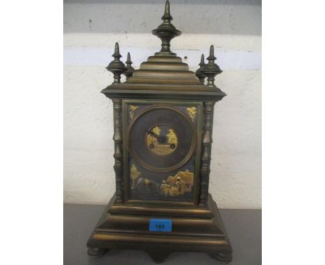 A late 19th century brass cased mantle clock with gilt ornament 