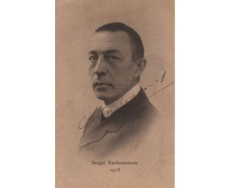 RACHMANINOFF SERGEI: (1873-1943) Russian Composer and Pianist. Vintage signed sepia postcard photograph of Rachmaninoff in a 