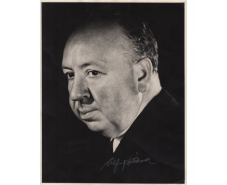 HITCHCOCK ALFRED: (1899-1980) British Film Director, Academy Award winner. Vintage signed 11 x 14 photograph of Hitchcock in 