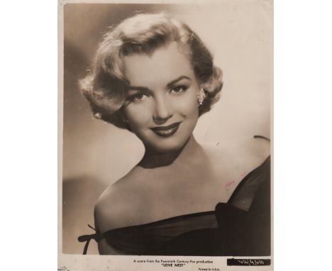 MONROE MARILYN: (1926-1962) American Actress and Sex Symbol. Vintage signed and inscribed 8 x 10 photograph of Monroe in a he