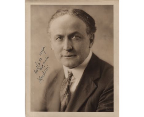 HOUDINI HARRY: (1874-1926) Hungarian-American Magician &amp; Escapologist. A good vintage signed and inscribed sepia 8 x 10 p