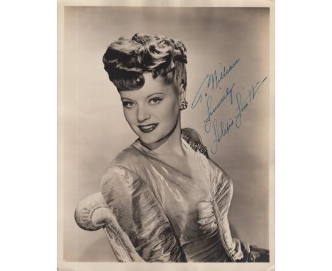 SMITH ALEXIS: (1921-1993) Canadian-born American Actress. Vintage signed and inscribed 8 x 10 photograph of Smith seated in a