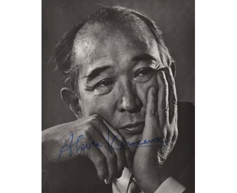 KUROSAWA AKIRA: (1910-1998) Japanese Film Director, Academy Award winner. Signed 8 x 10 photograph of Kurosawa in a close-up 