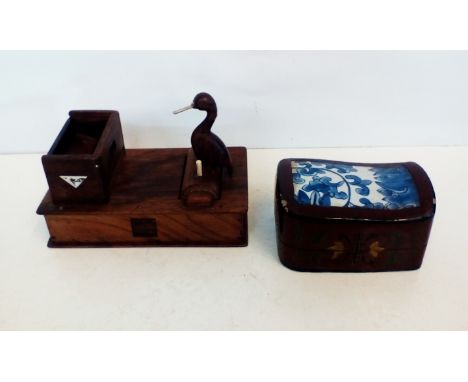 Cigarette Dispenser with a Wood and Ceramic Oriental Box
