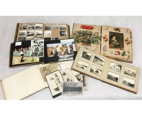A collection of vintage scrap books including a Victorian example, part photo albums, sketch books, postcards etc 
